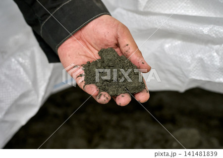 Hand Holding Soil Sample - Agricultural Concept Hand Holding Soil Sample - Agricultural Concept 141481839