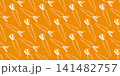 Carrot fruits on an orange background 141482757