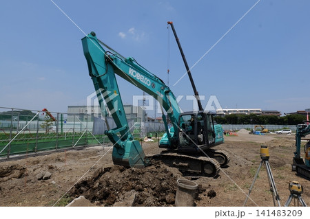 bulldozer Leveling Ground at Construction Site in Japan 141483209