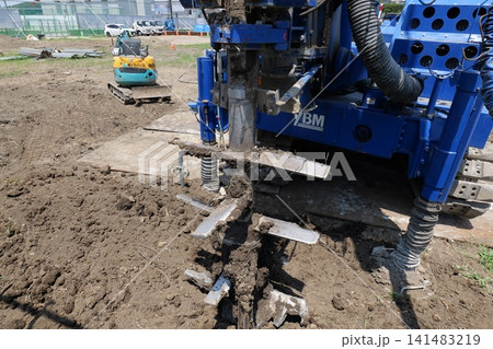bulldozer Leveling Ground at Construction Site in Japan bulldozer Leveling Ground at Construction Site in Japan 141483219