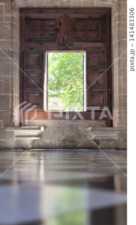 Historic stone doorway with open view to greenery Historic stone doorway with open view to greenery 141483306