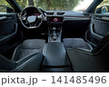 Luxury car interior with modern dashboard and steering wheel 141485496