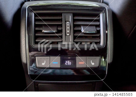 Car rear seat climate control panel interior Car rear seat climate control panel interior 141485503
