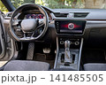 Luxury car interior with digital dashboard and steering wheel 141485505