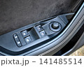 Car door window control panel close up 141485514