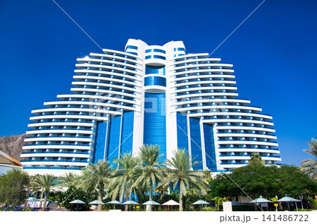 FUJAIRAH, UAE - November 16: Luxurious 5-star hotel Le Meridien Al Aqah Beach Resort on November 2, 2012 in Fujairah. FUJAIRAH, UAE - November 16: Luxurious 5-star hotel Le Meridien Al Aqah Beach Resort on November 2, 2012 in Fujairah. 141486722