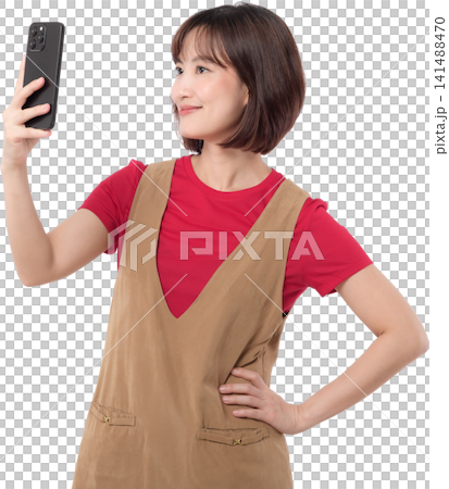 Happy happy asian woman taking selfie picture with smartphone against transparency background showing happy expression during fun online social media mobile phone. PNG file format 141488470