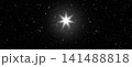 Glowing Star or Christmas Star in the Starry Night Sky 141488818