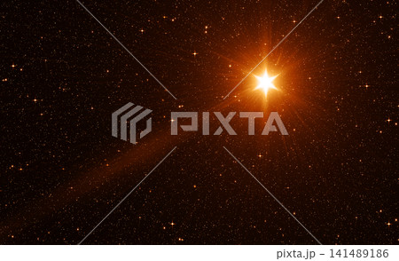 Bright Golden Christmas Star with Rays in the Starry Sky Bright Golden Christmas Star with Rays in the Starry Sky 141489186