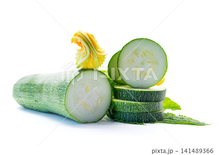 Fresh garden zucchini composition with sliced vegetable on white background Fresh garden zucchini composition with sliced vegetable on white background 141489366