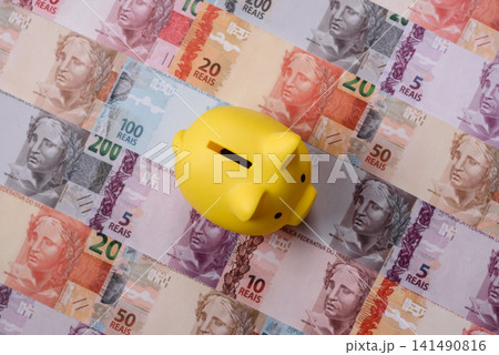 A piggy bank as a concept for storing, accumulating, and saving financial resources. A piggy bank A piggy bank as a concept for storing, accumulating, and saving financial resources. A piggy bank 141490816