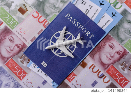 Sweden, swedish passport or id document with tickets for flight, travel. Swedish passport Sweden, swedish passport or id document with tickets for flight, travel. Swedish passport 141490844