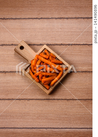 Seasoned sweet potato fries with sauce, fast food. Sweet potato fries 141490896