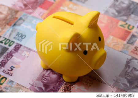 A piggy bank as a concept for storing, accumulating, and saving financial resources. A piggy bank A piggy bank as a concept for storing, accumulating, and saving financial resources. A piggy bank 141490908