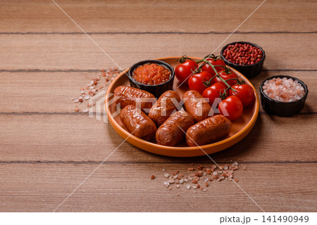 Chicken or pork grilling sausages with garlic, salt, and spices. Grilling sausages 141490949
