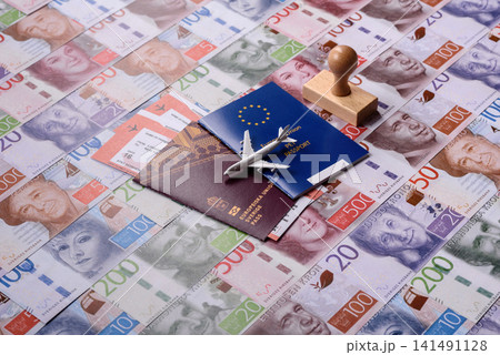 Sweden, swedish passport or id document with tickets for flight, travel. Swedish passport Sweden, swedish passport or id document with tickets for flight, travel. Swedish passport 141491128