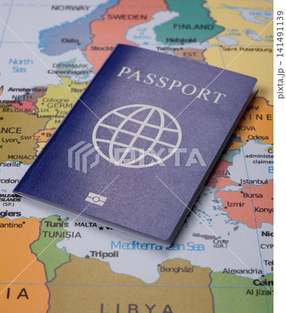 International passport against a map backdrop, concepts of travel. Passport on a map 141491139