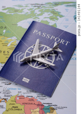 International passport against a map backdrop, concepts of travel. Passport on a map International passport against a map backdrop, concepts of travel. Passport on a map 141491144