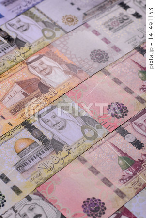 Saudi Arabia paper money, riyal banknotes and coins as currency for exchange. Saudi Arabia money 141491153