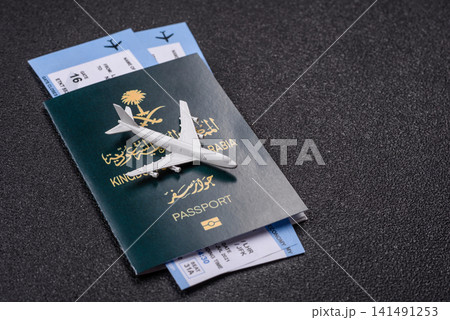 Saudi Arabia passport or id document with tickets for flight, travel. Saudi Arabia passport Saudi Arabia passport or id document with tickets for flight, travel. Saudi Arabia passport 141491253