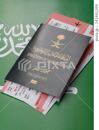 Saudi Arabia passport or id document with tickets for flight, travel. Saudi Arabia passport Saudi Arabia passport or id document with tickets for flight, travel. Saudi Arabia passport 141491269