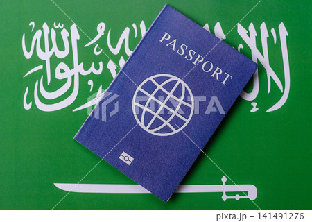 Saudi Arabia passport or id document with tickets for flight, travel. Saudi Arabia passport Saudi Arabia passport or id document with tickets for flight, travel. Saudi Arabia passport 141491276