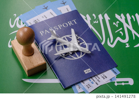 Saudi Arabia passport or id document with tickets for flight, travel. Saudi Arabia passport 141491278