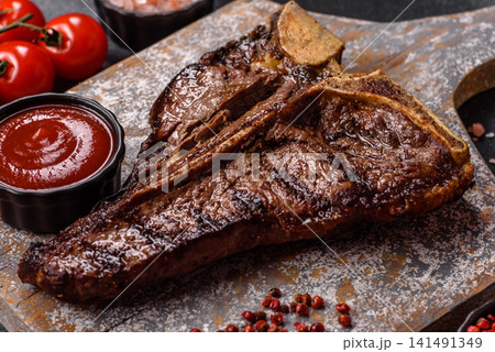 T-bone steak, beef meat grilled until done rare with salt and spices. T-bone steak 141491349