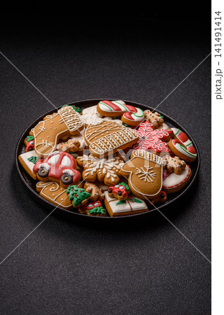 Gingerbread as a Christmas staple, sweet biscuits for the holiday table. Gingerbread as a backdrop 141491414