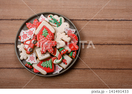 Gingerbread as a Christmas staple, sweet biscuits for the holiday table. Gingerbread as a backdrop Gingerbread as a Christmas staple, sweet biscuits for the holiday table. Gingerbread as a backdrop 141491433