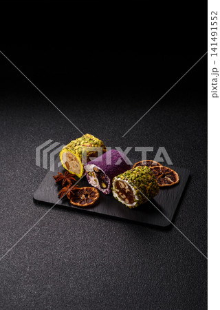 Turkish delight or lokum is a traditional Eastern sweet made with nuts. Turkish delight, lokum Turkish delight or lokum is a traditional Eastern sweet made with nuts. Turkish delight, lokum 141491552