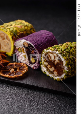 Turkish delight or lokum is a traditional Eastern sweet made with nuts. Turkish delight, lokum Turkish delight or lokum is a traditional Eastern sweet made with nuts. Turkish delight, lokum 141491554