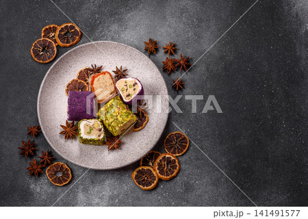 Turkish delight or lokum is a traditional Eastern sweet made with nuts. Turkish delight, lokum Turkish delight or lokum is a traditional Eastern sweet made with nuts. Turkish delight, lokum 141491577