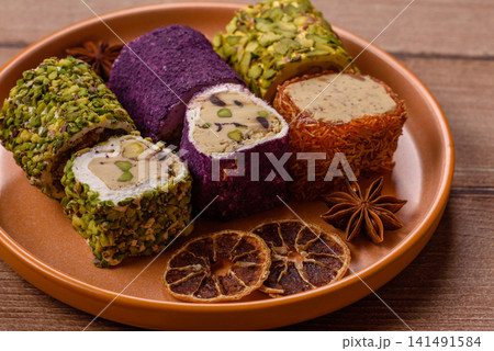 Turkish delight or lokum is a traditional Eastern sweet made with nuts. Turkish delight, lokum Turkish delight or lokum is a traditional Eastern sweet made with nuts. Turkish delight, lokum 141491584