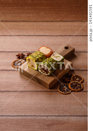 Turkish delight or lokum is a traditional Eastern sweet made with nuts. Turkish delight, lokum Turkish delight or lokum is a traditional Eastern sweet made with nuts. Turkish delight, lokum 141491591