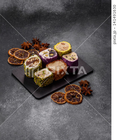 Turkish delight or lokum is a traditional Eastern sweet made with nuts. Turkish delight, lokum Turkish delight or lokum is a traditional Eastern sweet made with nuts. Turkish delight, lokum 141491630