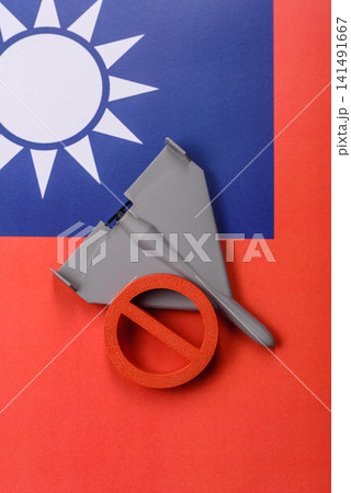 A Shahed drone featuring a prohibition symbol on the taiwanese flag as a conceptual background 141491667