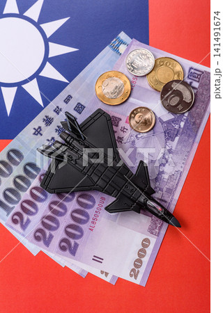 A fighter jet against the taiwanese flag as a conceptual background representing defense A fighter jet against the taiwanese flag as a conceptual background representing defense 141491674