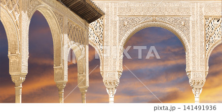 Arches in Islamic (Moorish) style (against the sunset) in Alhambra, Granada, Spain Arches in Islamic (Moorish) style (against the sunset) in Alhambra, Granada, Spain 141491936