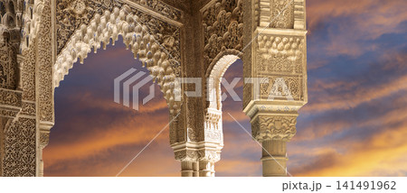 Arches in Islamic (Moorish) style (against the sunset) in Alhambra, Granada, Spain Arches in Islamic (Moorish) style (against the sunset) in Alhambra, Granada, Spain 141491962