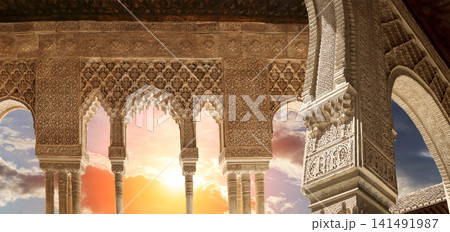 Arches in Islamic (Moorish) style (against the sunset) in Alhambra, Granada, Spain Arches in Islamic (Moorish) style (against the sunset) in Alhambra, Granada, Spain 141491987