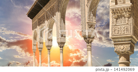 Arches in Islamic (Moorish) style (against the sunset) in Alhambra, Granada, Spain Arches in Islamic (Moorish) style (against the sunset) in Alhambra, Granada, Spain 141492069