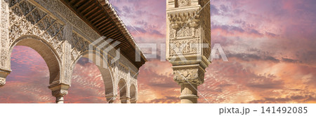 Arches in Islamic (Moorish) style (against the sunset) in Alhambra, Granada, Spain Arches in Islamic (Moorish) style (against the sunset) in Alhambra, Granada, Spain 141492085