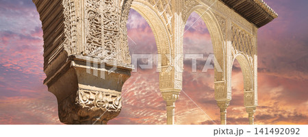 Arches in Islamic (Moorish) style (against the sunset) in Alhambra, Granada, Spain Arches in Islamic (Moorish) style (against the sunset) in Alhambra, Granada, Spain 141492092