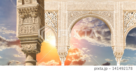 Arches in Islamic (Moorish) style (against the sunset) in Alhambra, Granada, Spain Arches in Islamic (Moorish) style (against the sunset) in Alhambra, Granada, Spain 141492178