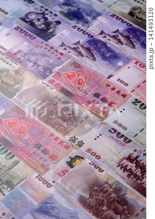 Taiwan, Taiwanese paper banknotes and coins, dollars of various denominations. Taiwanese dollars Taiwan, Taiwanese paper banknotes and coins, dollars of various denominations. Taiwanese dollars 141493120