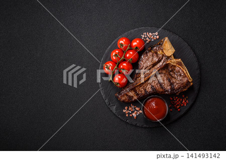 T-bone steak, beef meat grilled until done rare with salt and spices. T-bone steak 141493142