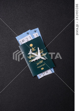 Saudi Arabia passport or id document with tickets for flight, travel. Saudi Arabia passport Saudi Arabia passport or id document with tickets for flight, travel. Saudi Arabia passport 141493166