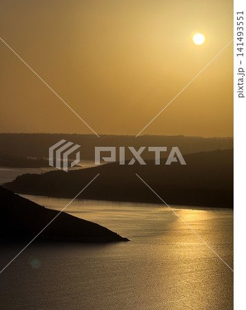 River winding through hills at golden hour sunset River winding through hills at golden hour sunset 141493551