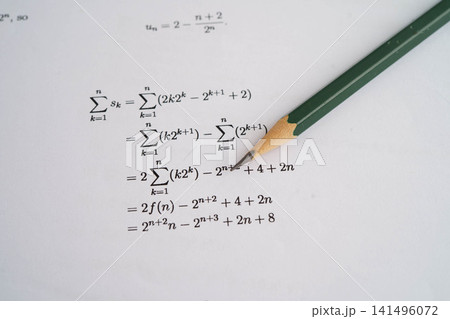 Pencil on mathematic formula exercise test paper in education school. 141496072